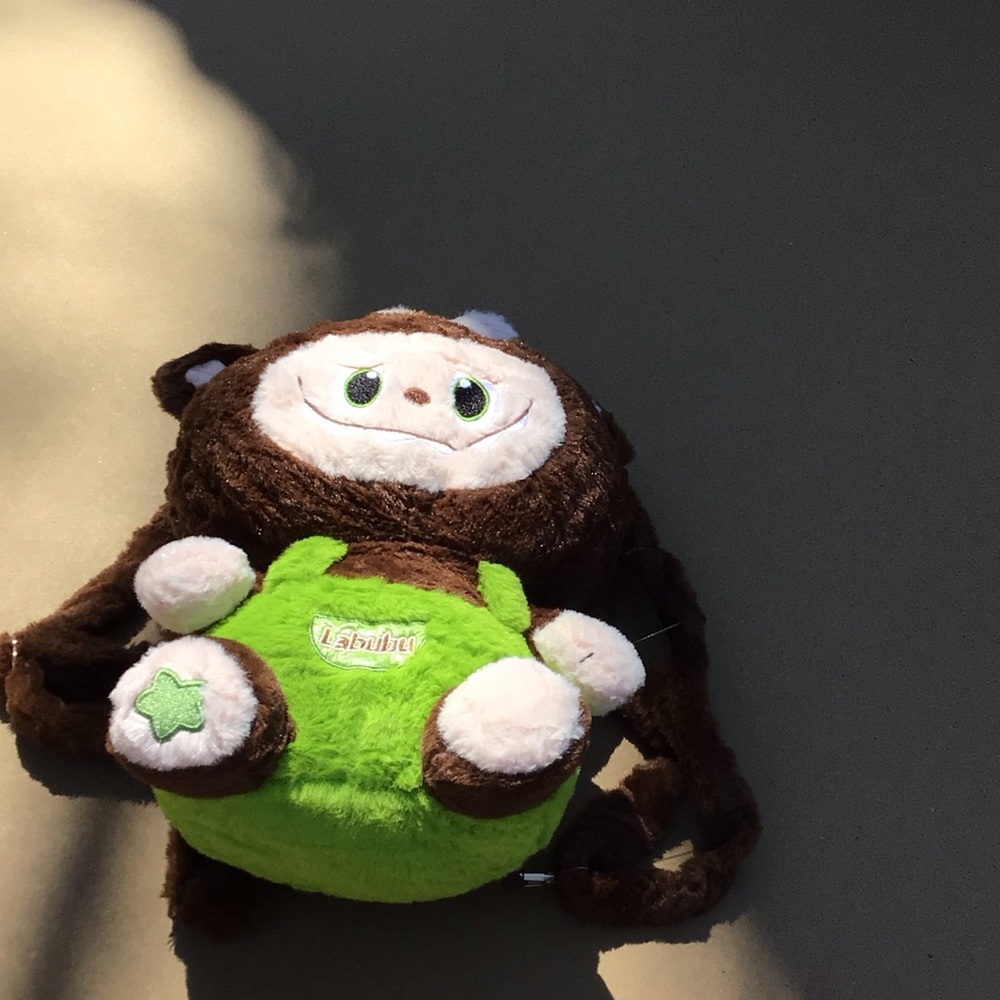 Plush Brown Monkey Backpack with Bright Green Front Pocket - Labubu